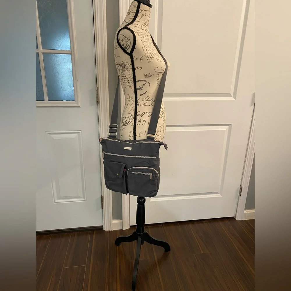Baggallini Gray Crossbody Bag w/ Zip Closure, Pink Interior, and Lots of Pockets - Picture 2 of 5